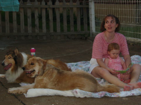 Aunt Rhonda reading to Jane with Bubba and Shannon nearby